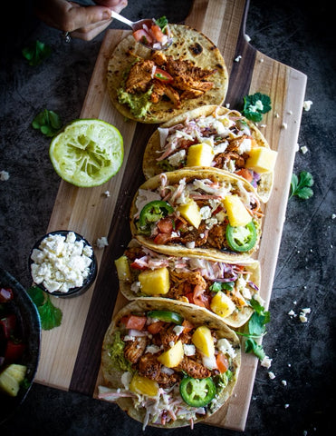 Chicken tacos with mango and jalapeño